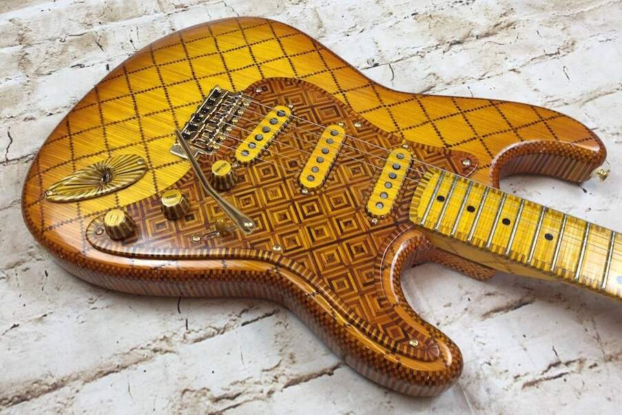 Guitarra feita de palitos de fósforo