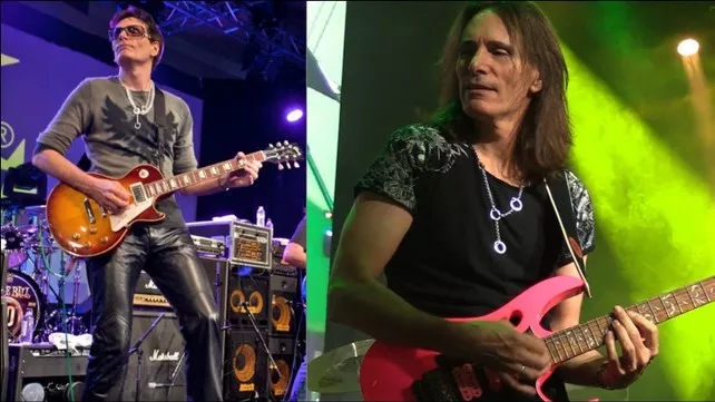 Steve Vai tocando com uma Les Paul Steve Vai com uma Les Paul e uma Ibanez