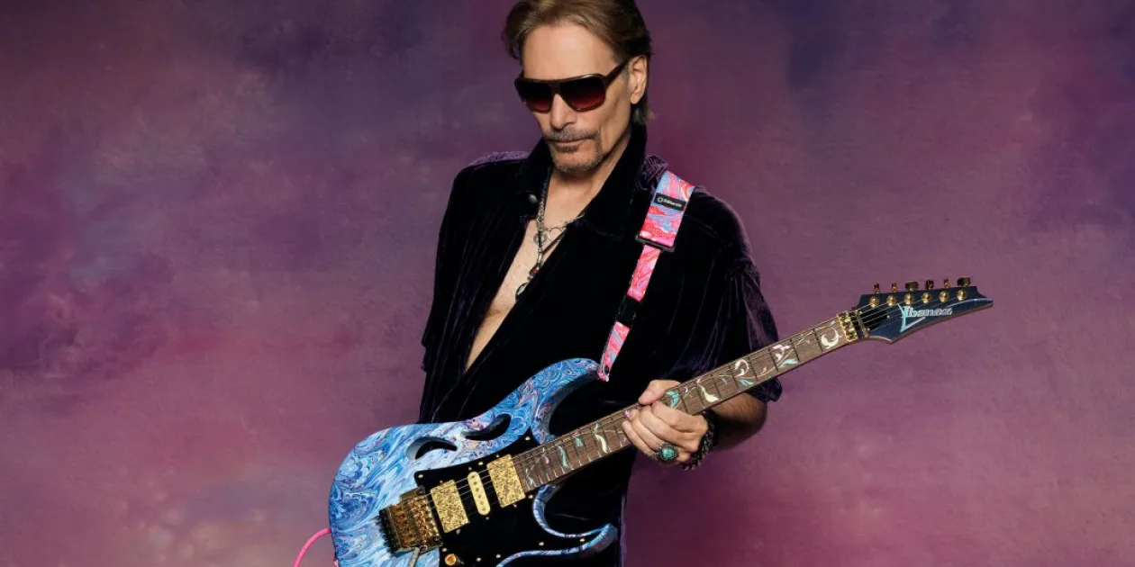Por que Steve Vai toca com guitarras da Ibanez?